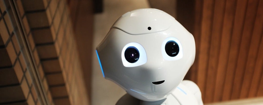 Robot staring up at camera