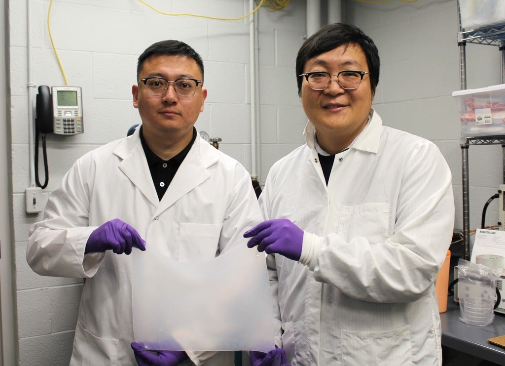 Dr. Youchao Teng (left) and Dr. Yimin Wu display some of the new gel material they developed to help heal soft-tissue injuries.