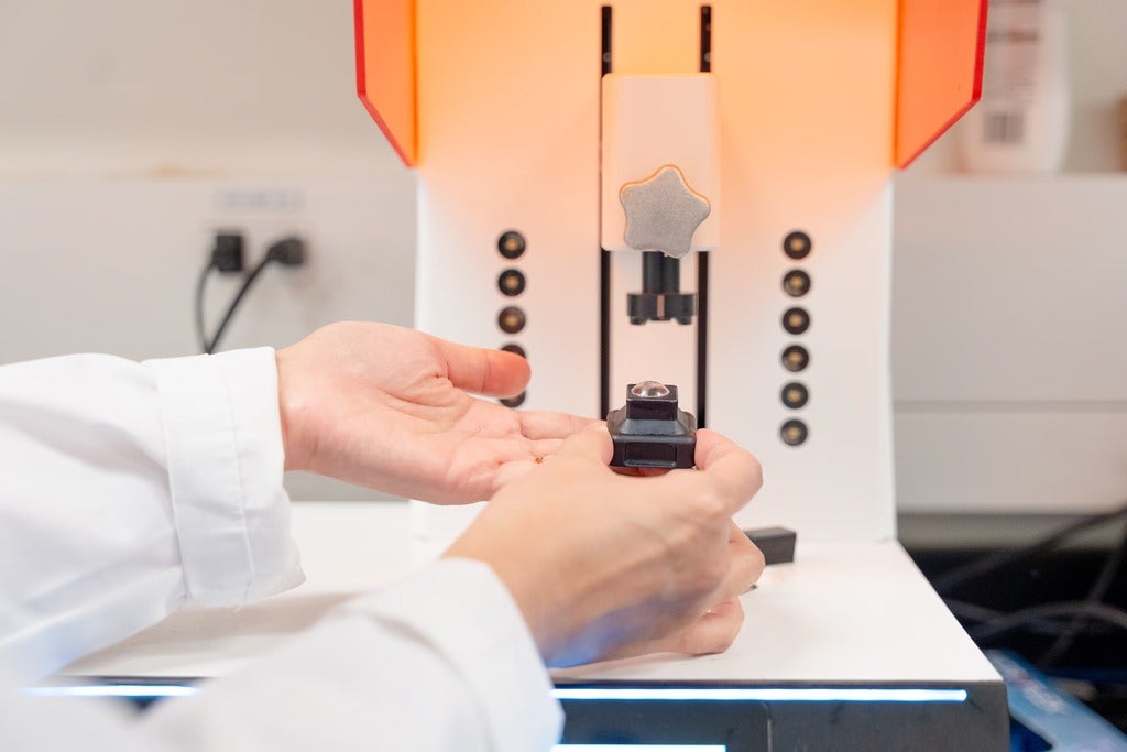 A close-up of the 3D-printed contact lens on the printing platform in University of Waterloo’s Tang Nanotechnology Lab.