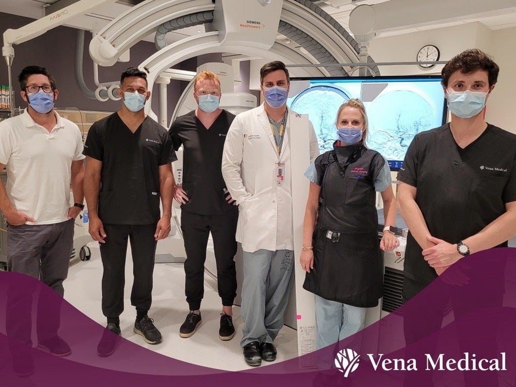 Michael Phillips of Vena Medical, third from left, poses with a medical team at the London Health Sciences Centre in London.