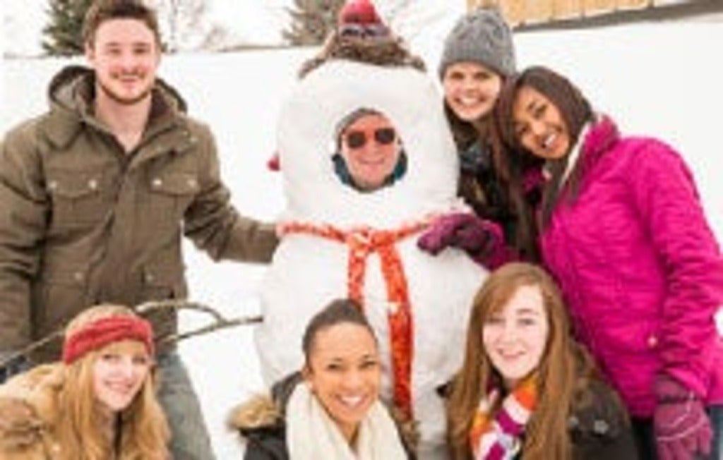 Waterloo students pose with snowman
