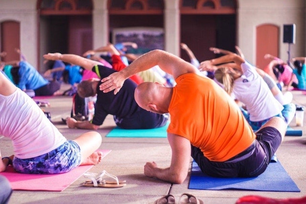 People doing yoga.