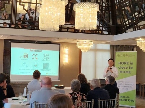 Yusheng Zhao, PhD student from Waterloo Pharmacy, presenting his research at a conference. 