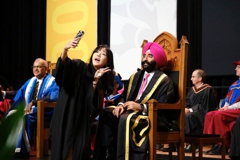 Waterloo chancellor on convocation stage