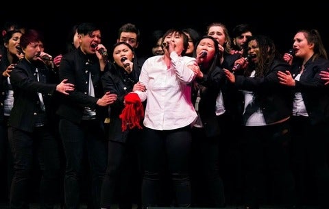 In Full Colour Singing Group Performing