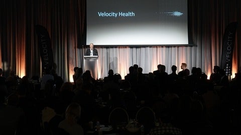 Adrien Cote speaking at Velocity Health launch event