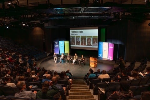 Panel of four speakers.
