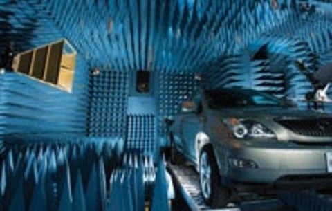 Car with antenna in test lab