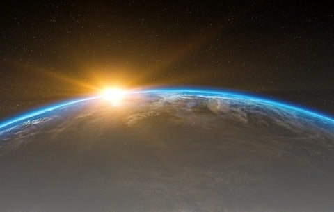 Sun rising over Earth