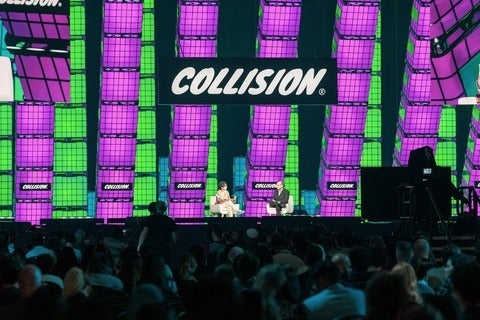 Presenters on stage at the Collision conference