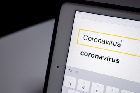 tablet showing user is searching the word Coronavirus