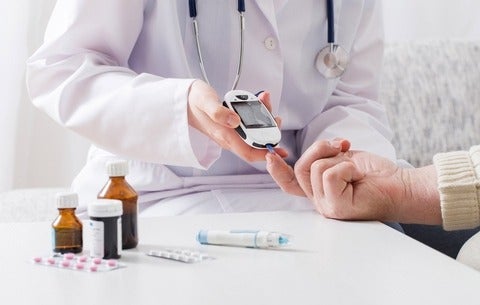 Diabetes patient getting their blood checked