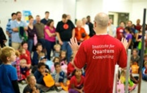 Instructor leads open house at the Institute for Quantum Computing