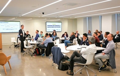 Jimmy Lin speaking to a group of business and technology leaders on the practical use of artificial intelligence