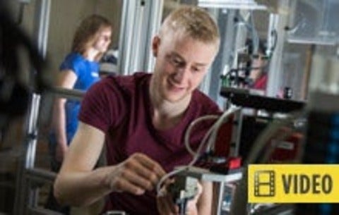 Engineering co-op student in lab - this story contains video