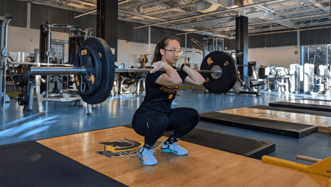 Evelyn Jiang lifts heavy weights in gym