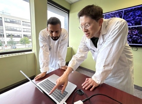 Nima Abbasi (left) and Dr. Alexander Wong helped develop a new AI model that enhances the clarity of medical images used to diag