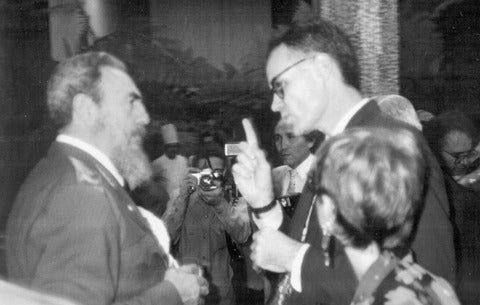 Jim Blight speaking with Fidel Castro