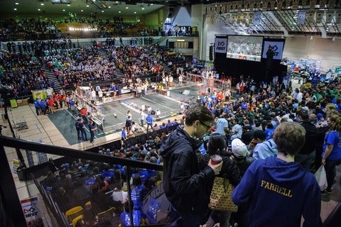 Image of audience sitting in the bleachers at PAC at the FIRST competition