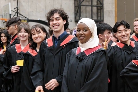 New graduates pose after convocation