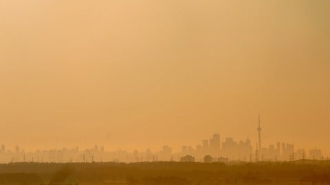 smoke-filled sky with the Toronto skyline
