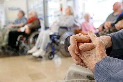 Older adults sitting in wheelchairs 