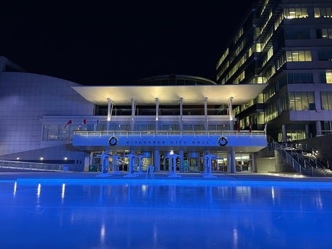 City of Kitchener’s Carl Zehr Square lit up in blue