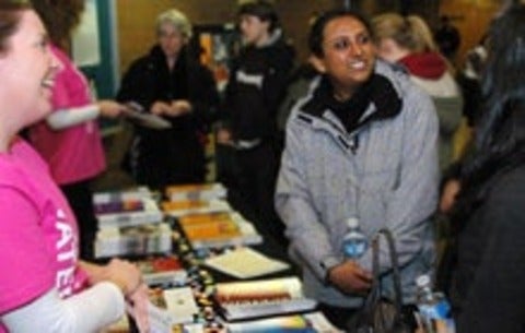 Prospective students engage with family night volunteers at Waterloo