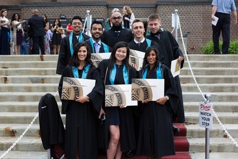 Group photo on steps at convocation.