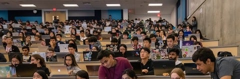 StarterHacks students in lecture hall with laptops