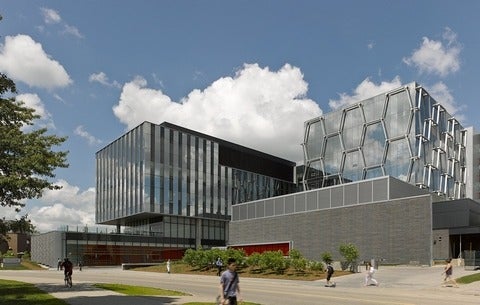 Exterior of the Mike and Ophelia Lazaridis Quantum-Nano Centre in the spring