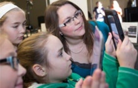 Jennifer Howcroft with members of the Girls Club