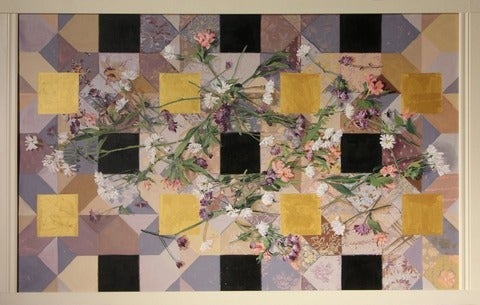 Art piece by Jess Lincoln featuring geometric, coloured squares and triangles with flowers strewn about