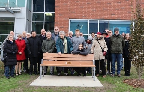 Family and friends of Professor Josef Paldus gather at unveiling of memorial bench and tree at the University of Waterloo. 