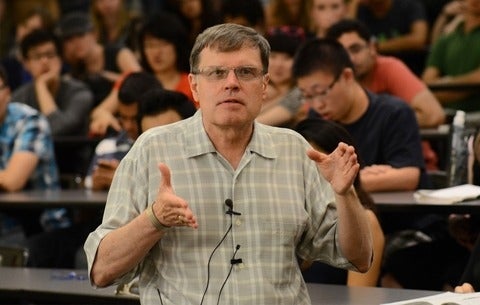 Larry Smith speaking at a lecture