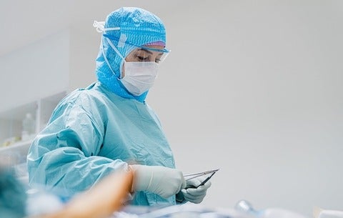 female staff working in medical gear