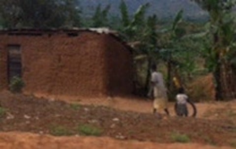 woman walking in Nakivale refugee settlement