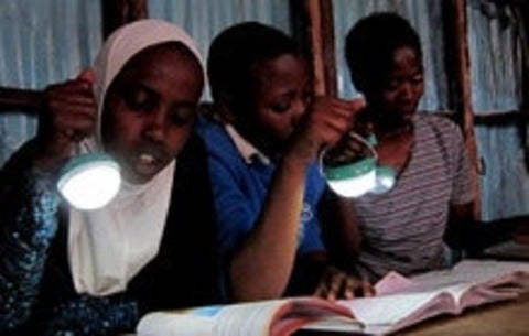 Students using Nokero solar lights