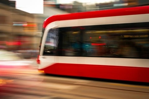 Public transit vehicle moves quickly 