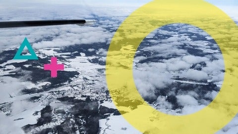 A plane flying over a snow pack