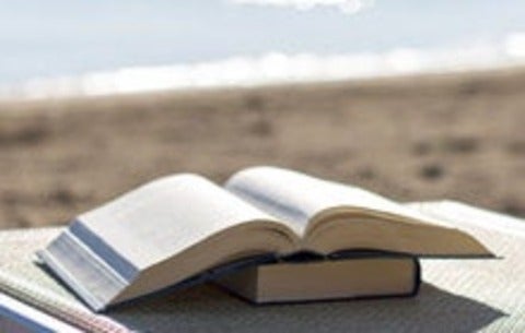Open book on a beach