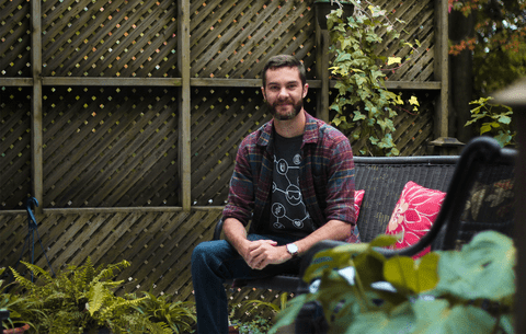 Tim Shardlow sitting outside