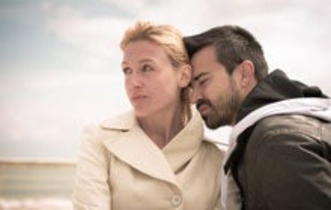 man and woman looking upset