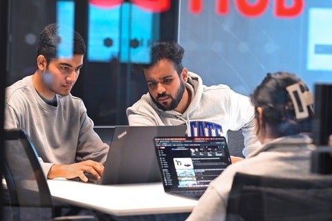 Waterloo students working on their laptops