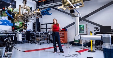 Mary McPhee testing part of the Canadarm2 robotic arm