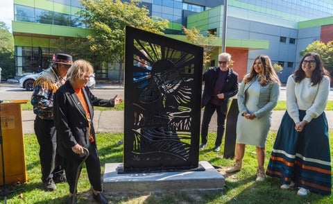 Carolyn King, Elder Myeengun Henry, John Lewis, Laurie Froman and Amanda St. Marie with Moccasin Identifier treaty marker