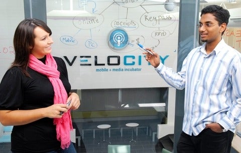Two people hold a velocity brainstorming session