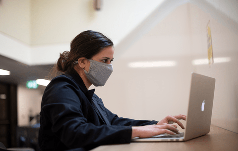 Woman working at her laptop