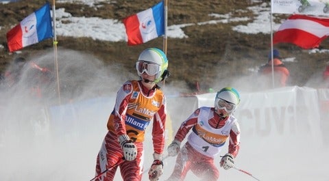 The women's visually impaired Super-G event at the 2013 IPC Alpine World Championships in La Molina, Spain. Henrieta Farkasova and guide Natalia Subtrova. Photo by: LauraHale,  Creative Commons Attribution-Share Alike 3.0 Unported.