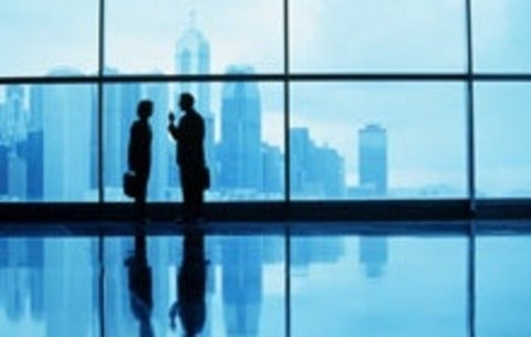 workers talking at window